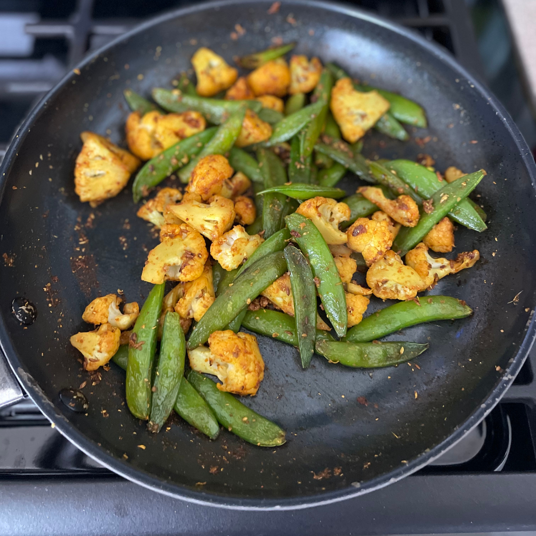 Cauliflower green peas stir fry